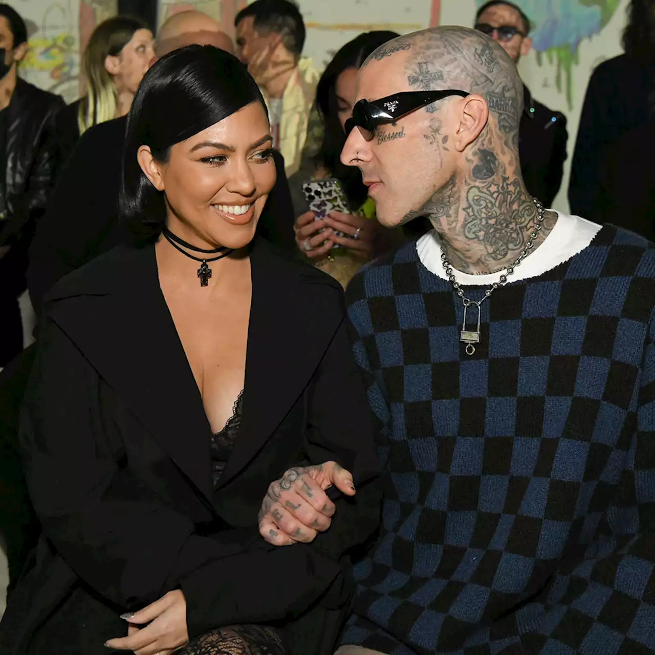 See Travis Barker’s Cheeky Comment on Kourtney Kardashian’s Steamy Beach Pics - E! Online