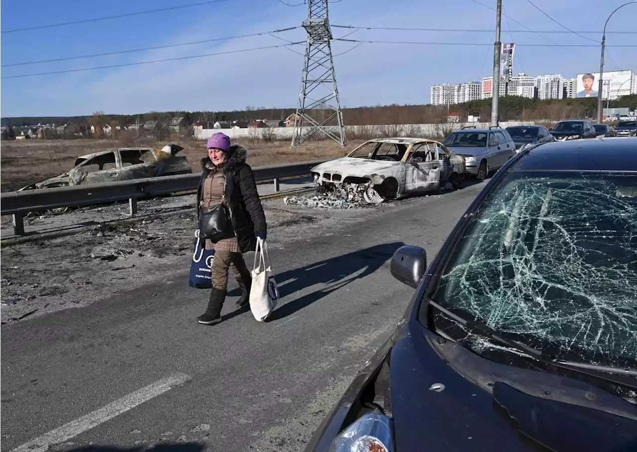 In Photos: Russian forces continue to advance, encircle Ukrainian cities