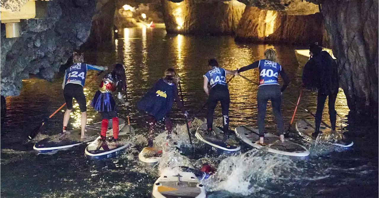 Europe's biggest underground lake hosts stand up paddle board race