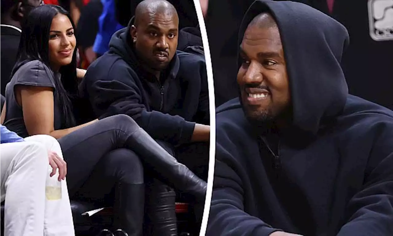 Kanye West and girlfriend Chaney Jones are all smiles at NBA game