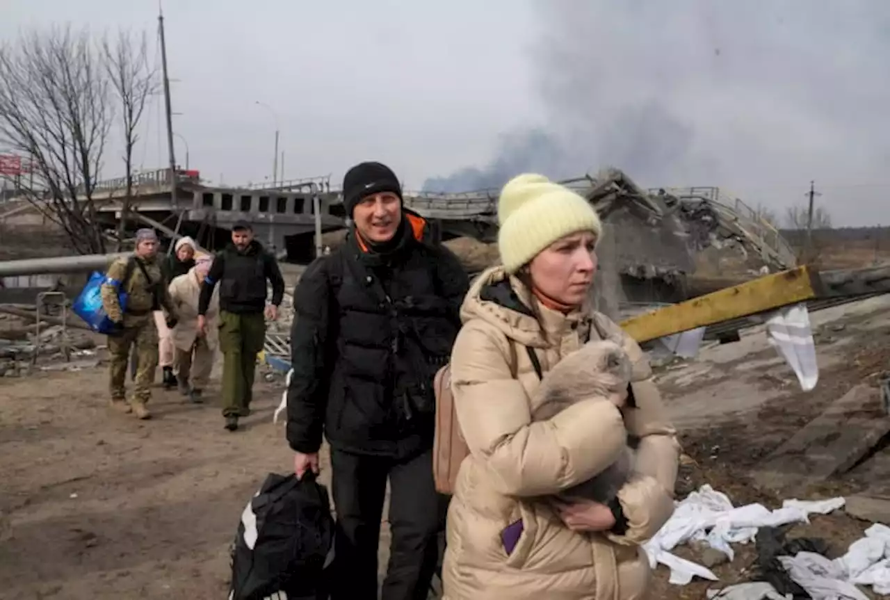 Russia strikes near Ukrainian capital; port city under siege