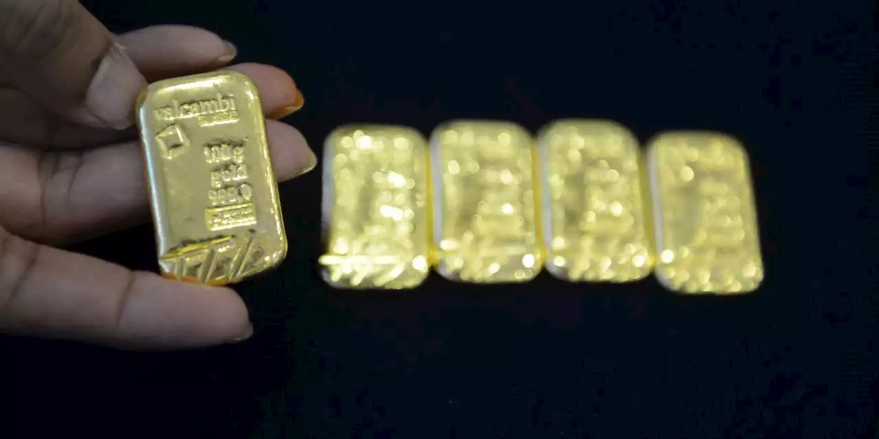 Gold futures skid sharply lower as investors watch Ukraine-Russia, await Fed decision