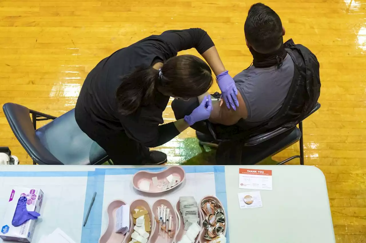 Chicago Public Schools defends its vaccine mandate for teachers in court amid separate fight with union over the end of the mask rule