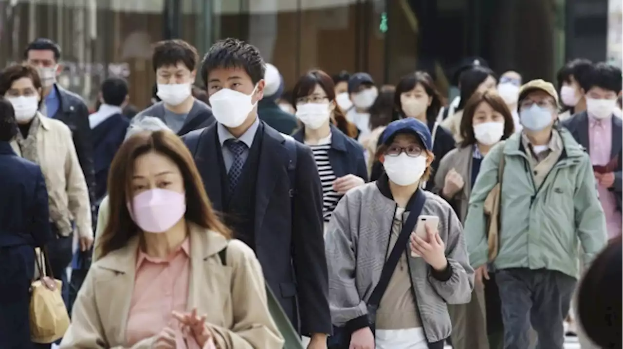 Japan to fully lift COVID-19 restrictions as infections slow