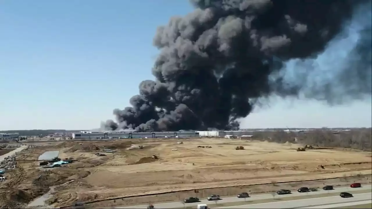 Walmart warehouse fire: Massive blaze sends huge plume of smoke into air over Indianapolis