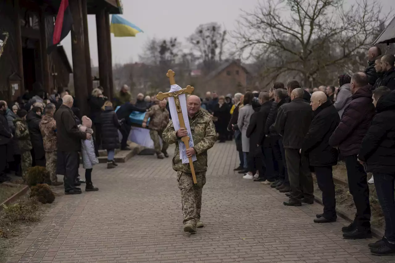 AP PHOTOS: Day 21: Ukraine war toll seen in drawing, tears