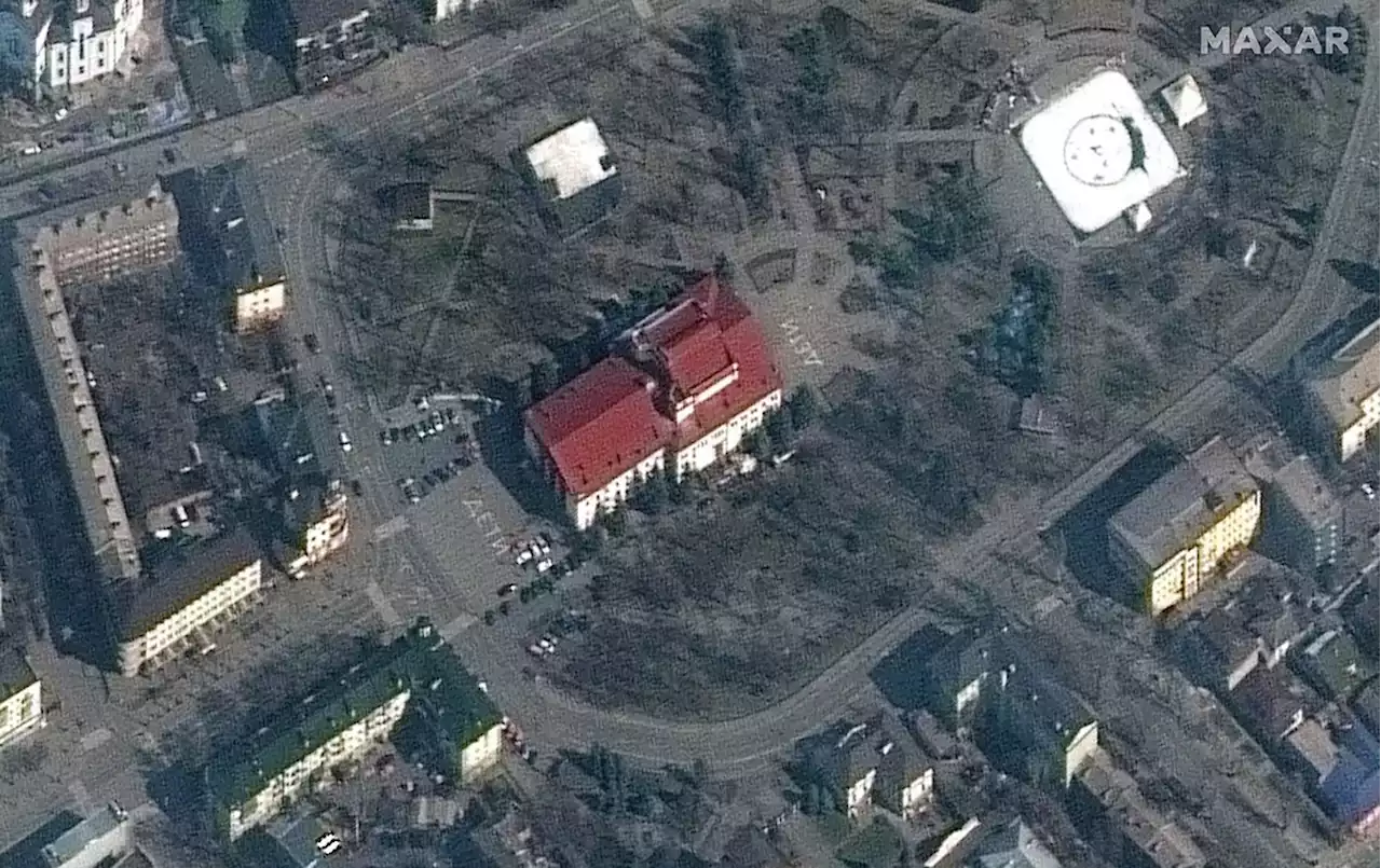 'Children' was spelled out on two sides of Mariupol theater before bombing, satellite images show