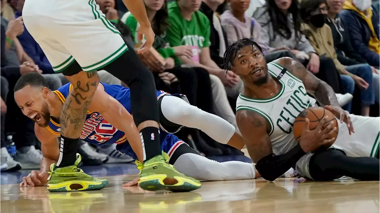 Watch: Stephen Curry Injures Foot After Collision With Marcus Smart