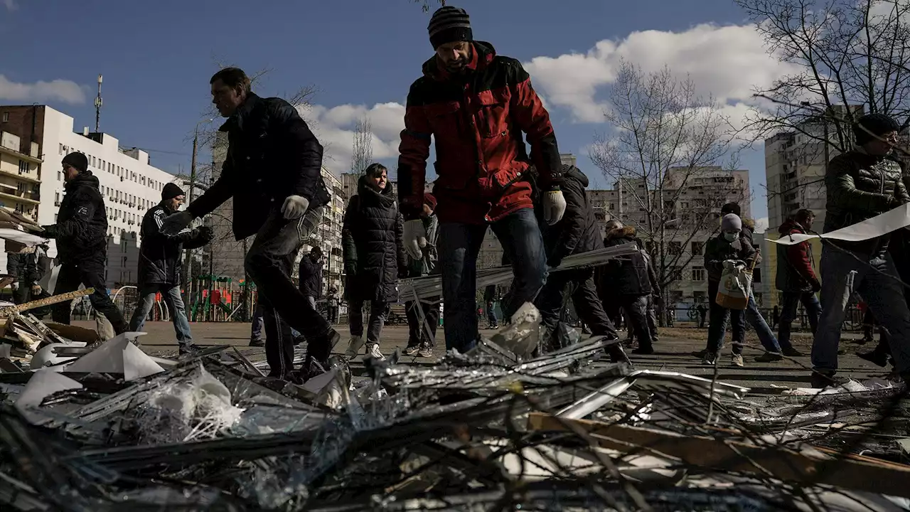 Rescuers Search for Survivors in Smashed Mariupol Theater Blown Apart by Russian Airstrike