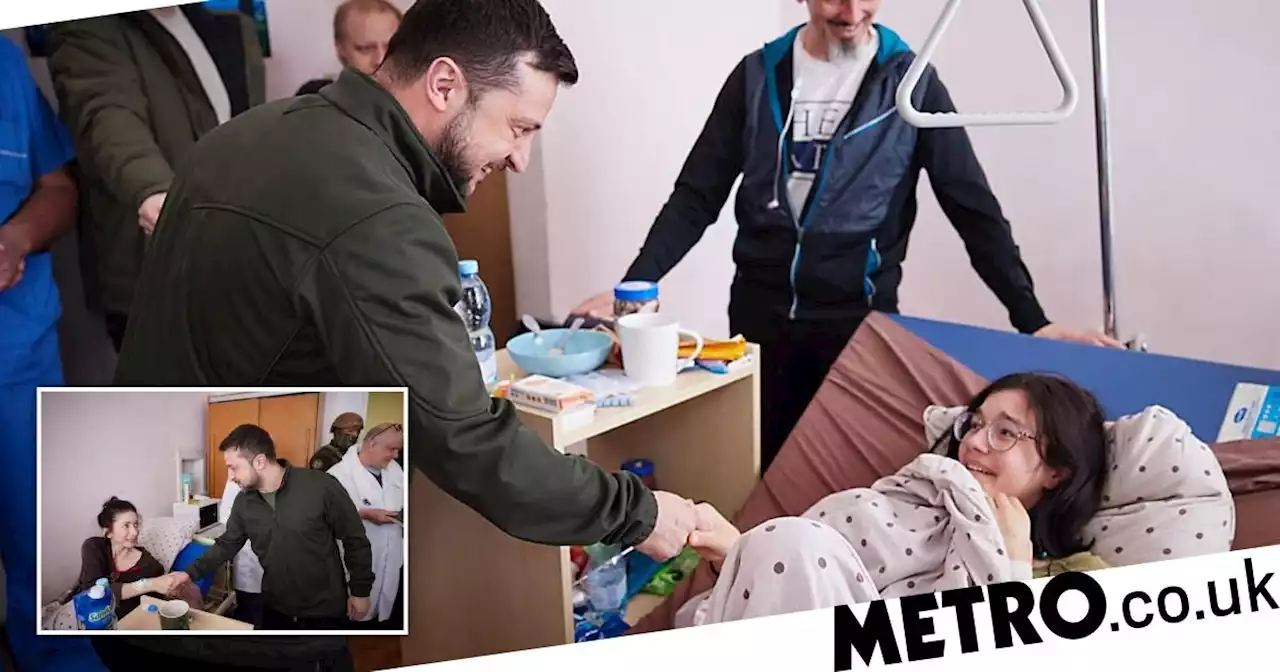 Teen patient overwhelmed as Zelensky gives her flowers in Kyiv hospital visit