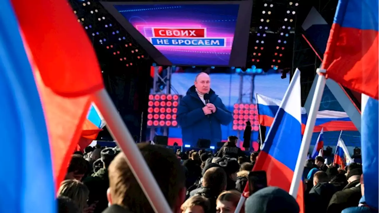 Putin appears at big rally as troops press attack in Ukraine