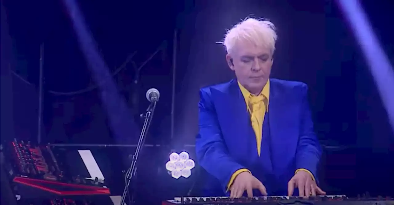 Duran Duran's Nick Rhodes Steals the Show Wearing Ukraine's Colors on Corden