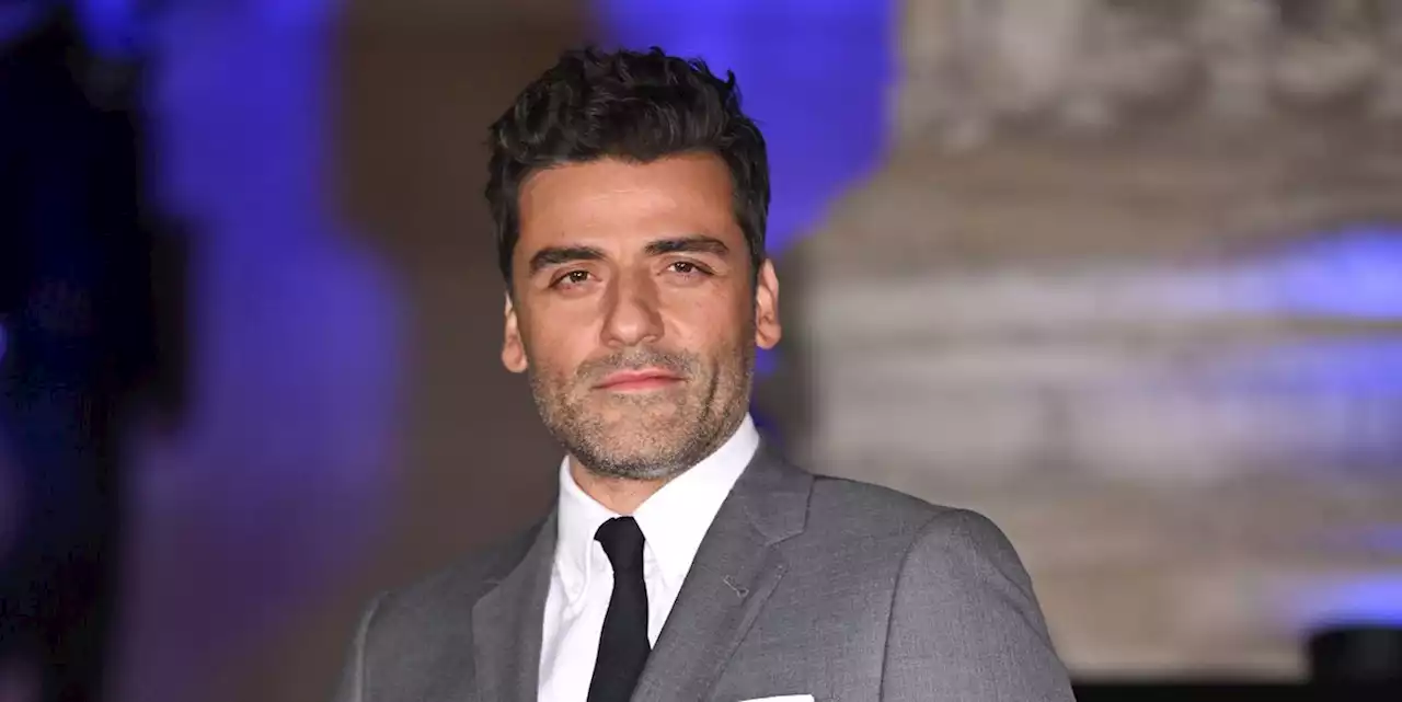 Oscar Isaac Dons a Thom Browne Skirt Suit for London Red Carpet