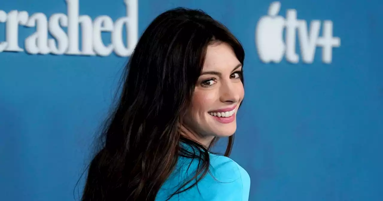 Anne Hathaway stuns in powder blue dress with daring cutouts