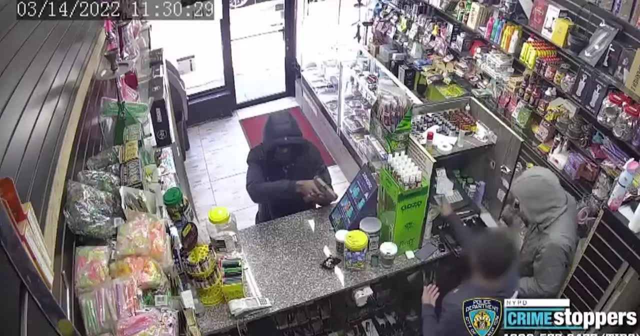 NYPD searching for suspects caught on video robbing Brooklyn convenience store at gunpoint