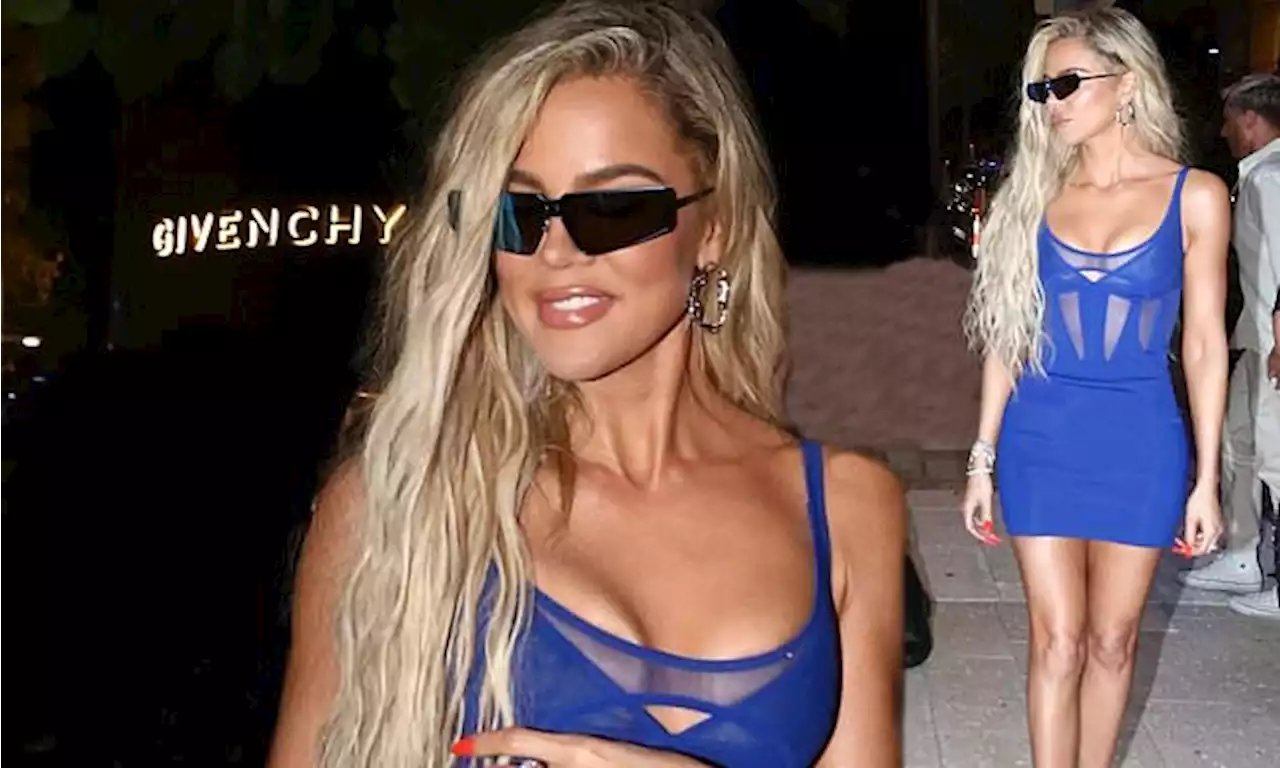 Khloe Kardashian flaunts her curves in a thigh skimming mini dress