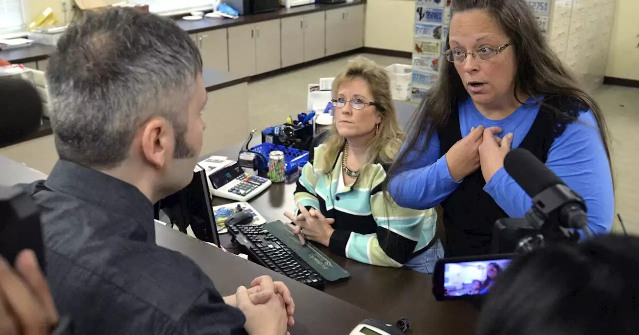 Federal judge sides with two Kentucky same-sex couples, rules county clerk violated their constitutional rights