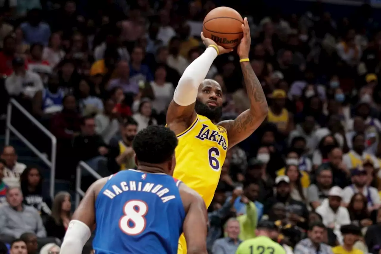 LeBron James passes Karl Malone for No. 2 on scoring list, but Lakers fall to Wizards