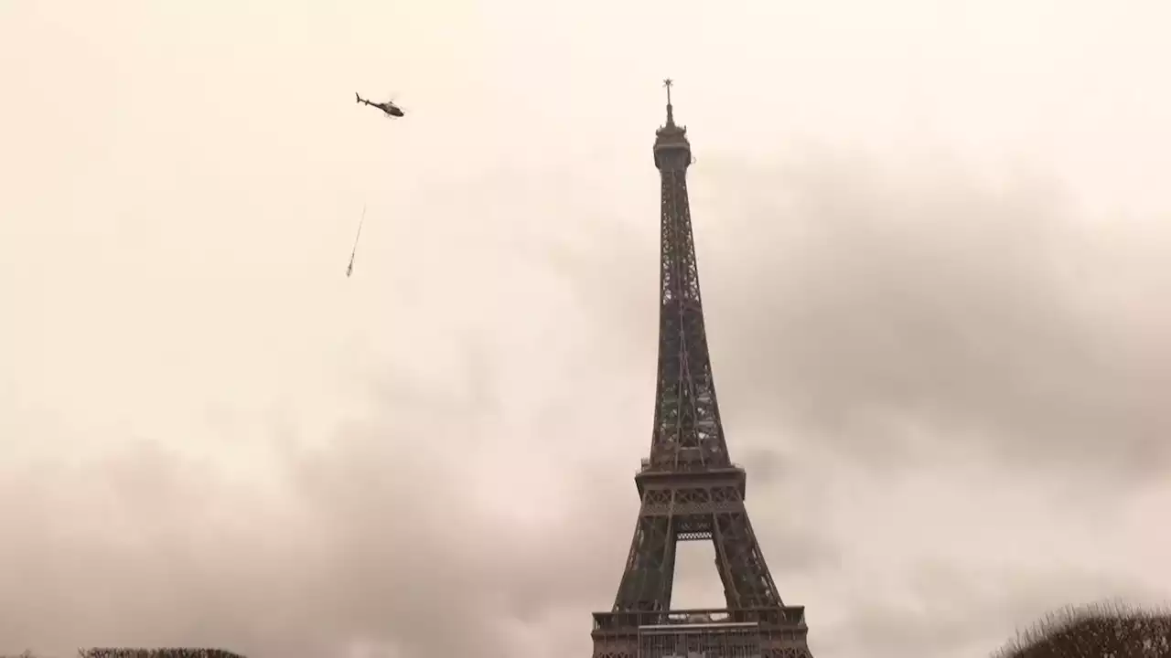 Eiffel Tower grows six metres after new antenna attached