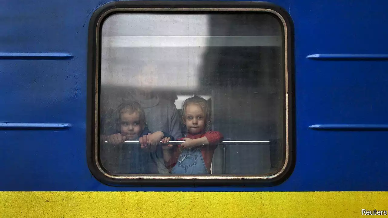 Trains run through the dark to keep Ukraine going