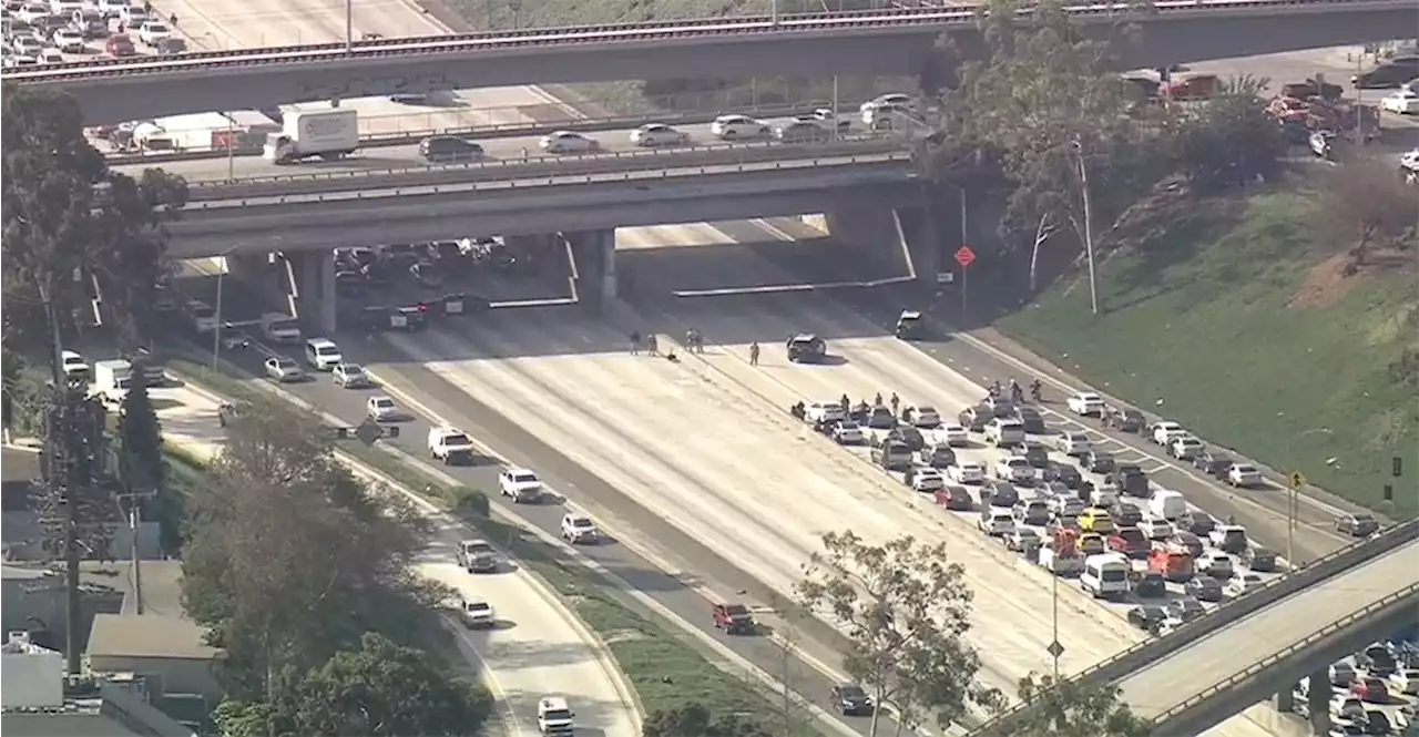 All Lanes Of 405 Freeway Near LAX Briefly Shut Down In Both Directions To Get Man Safely Off Ledge