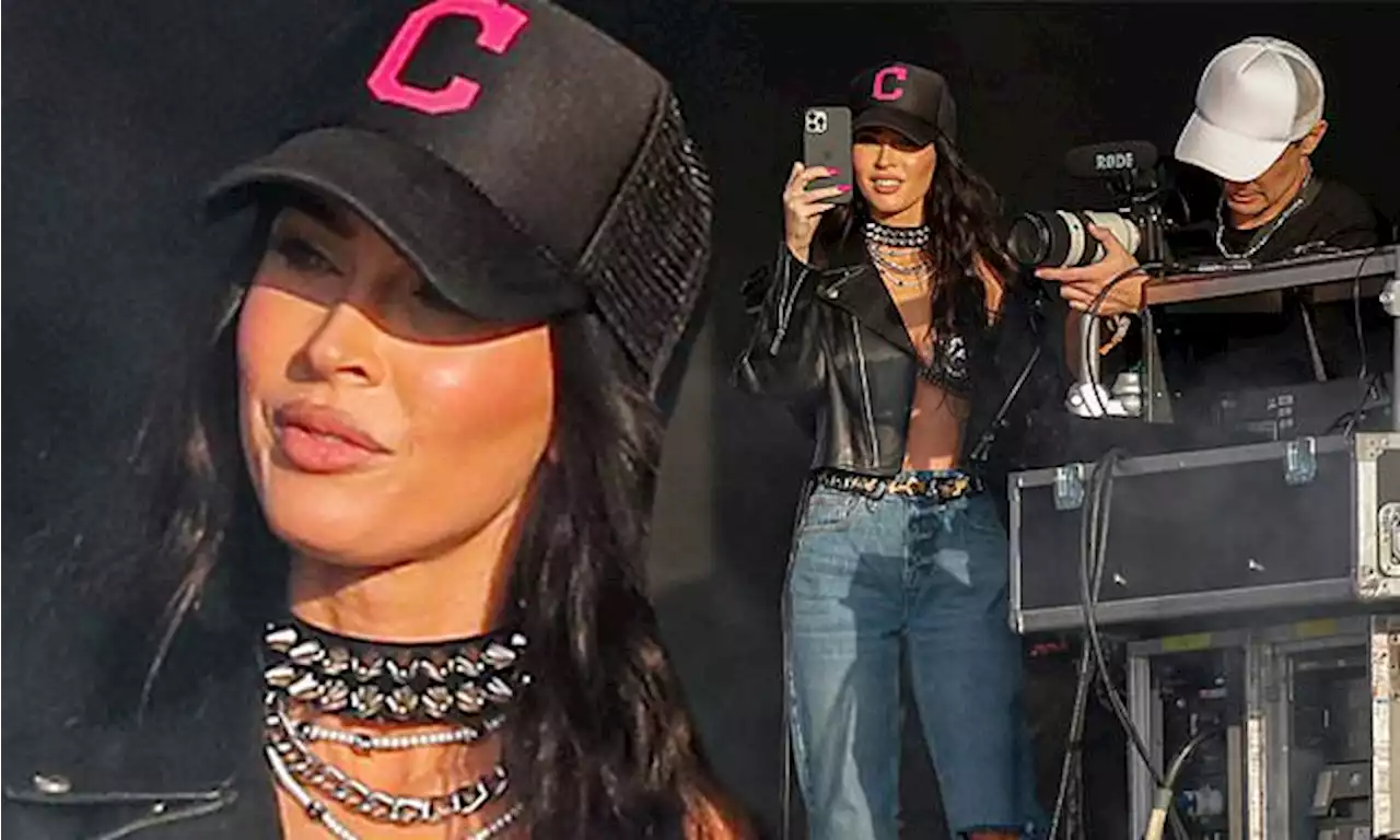 Megan Fox is fiance MGK's biggest fan as she snaps photos of him