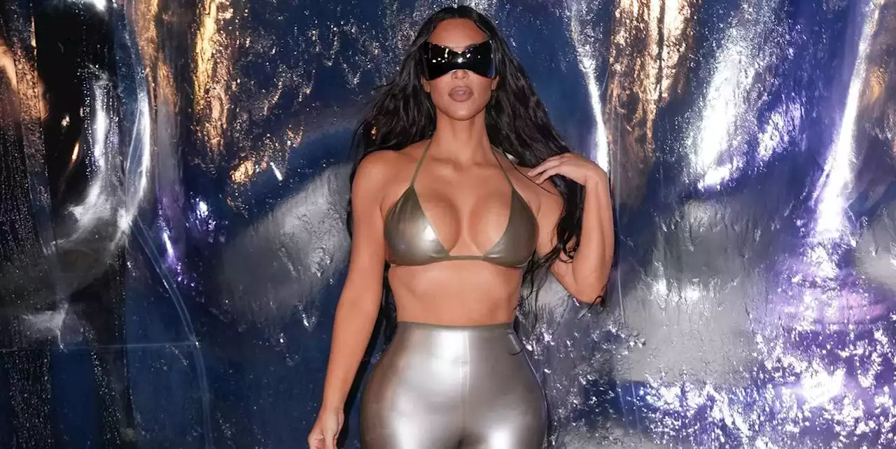 Kim Kardashian Is a Metallic Diva in a Matching Silver Bikini Top and Leggings