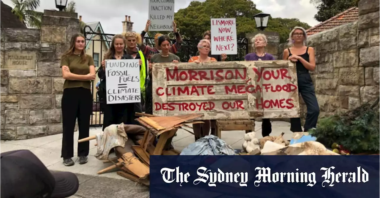 Flood-hit Lismore residents dump debris outside Kirribilli House