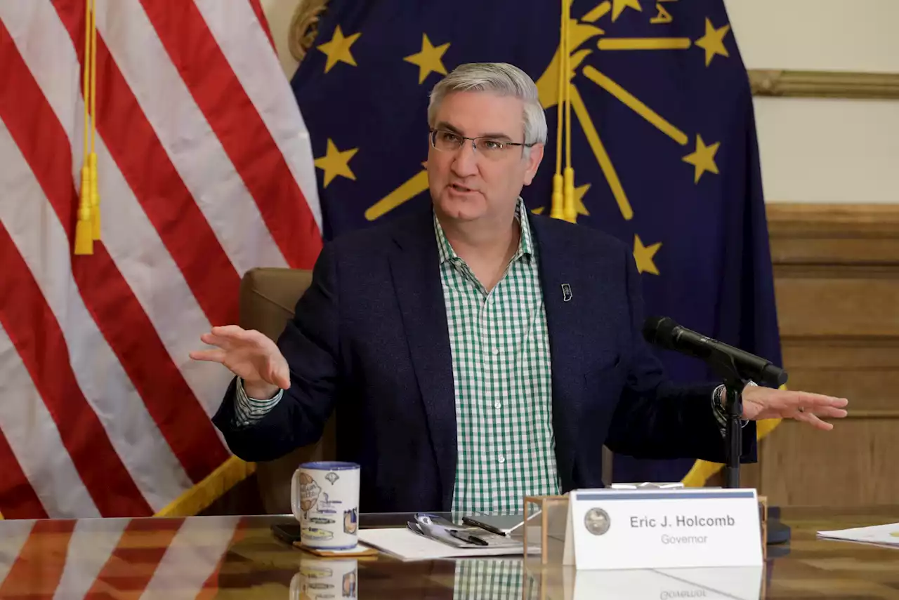 Republican Indiana governor vetoes transgender girls sports ban, signs no-permit gun bill