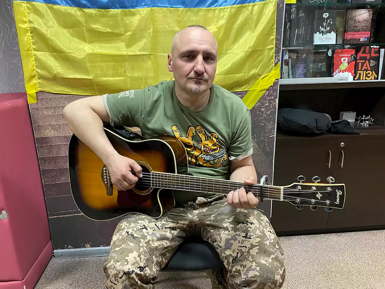 How this musician went from playing protest songs to picking up arms to fight against Putin's army