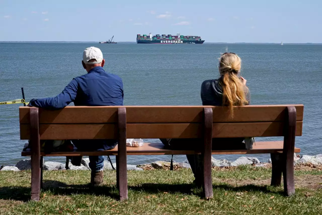 Dredging aims to free grounded cargo ship in Chesapeake Bay