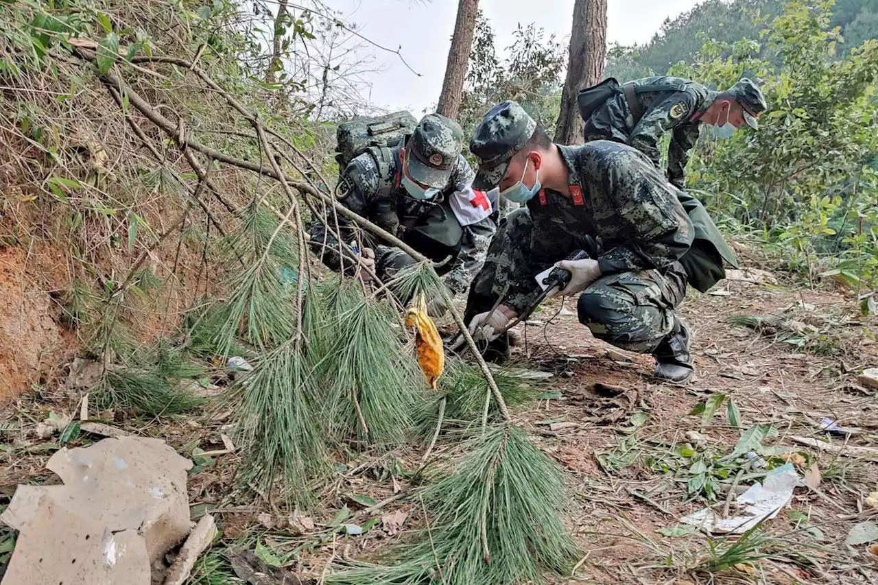Wallets, IDs but no survivors found in China Eastern crash