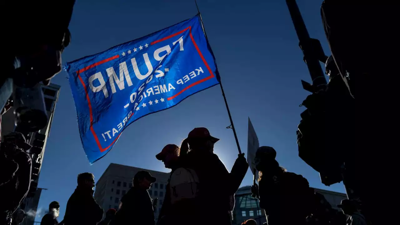 Pro-Trump Group Sent Armed Members to Colorado Voters' Doors, Lawsuit Alleges