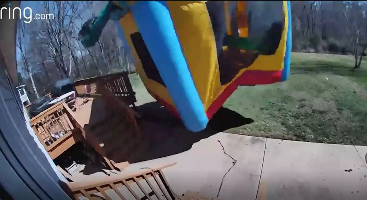 Video shows bounce house in North Carolina being picked up by wind, flying toward child