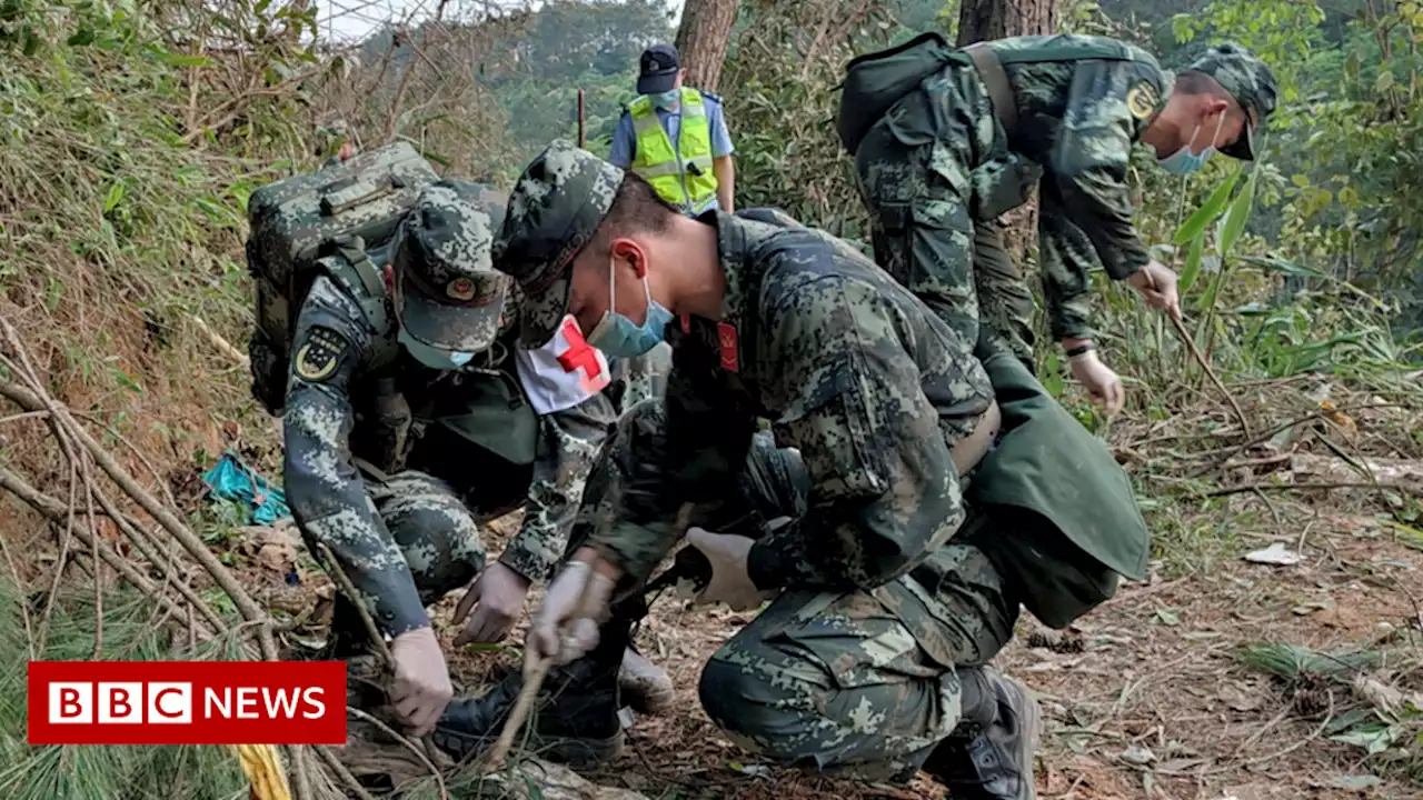 China plane crash: Search and rescue operation halted by rain