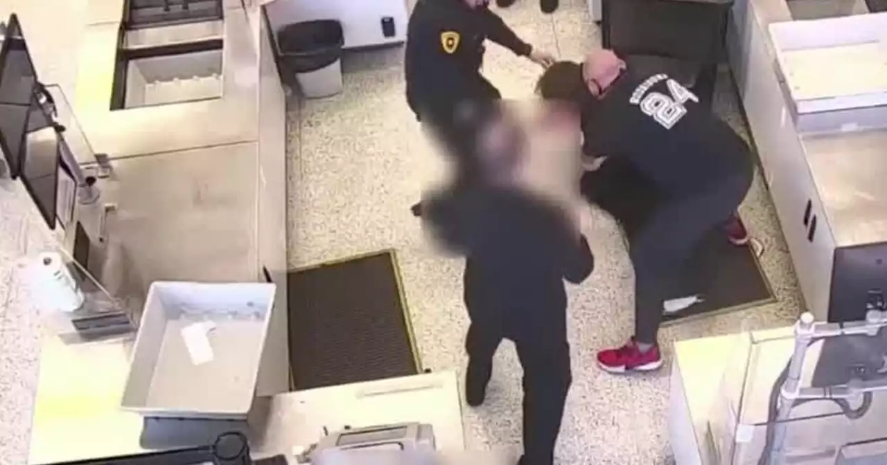 Video from assault on SLCPD officer at airport shows bystander stepping in to help