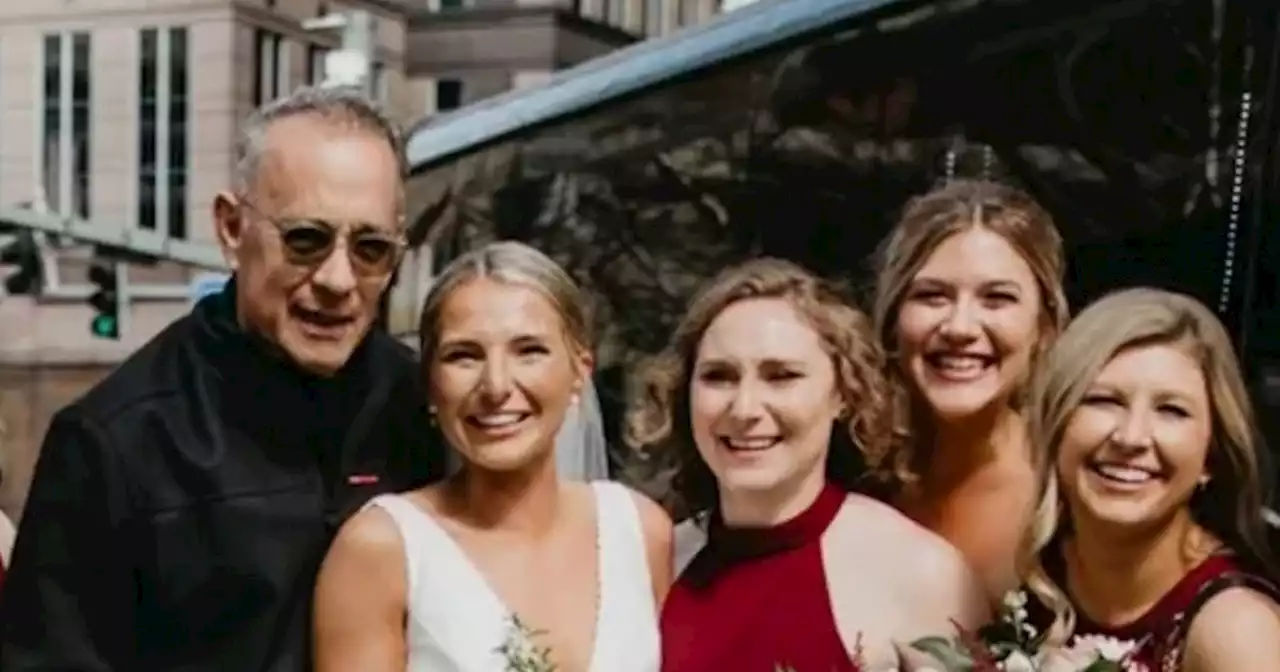 Tom Hanks crashes another wedding as he surprises bride during photoshoot