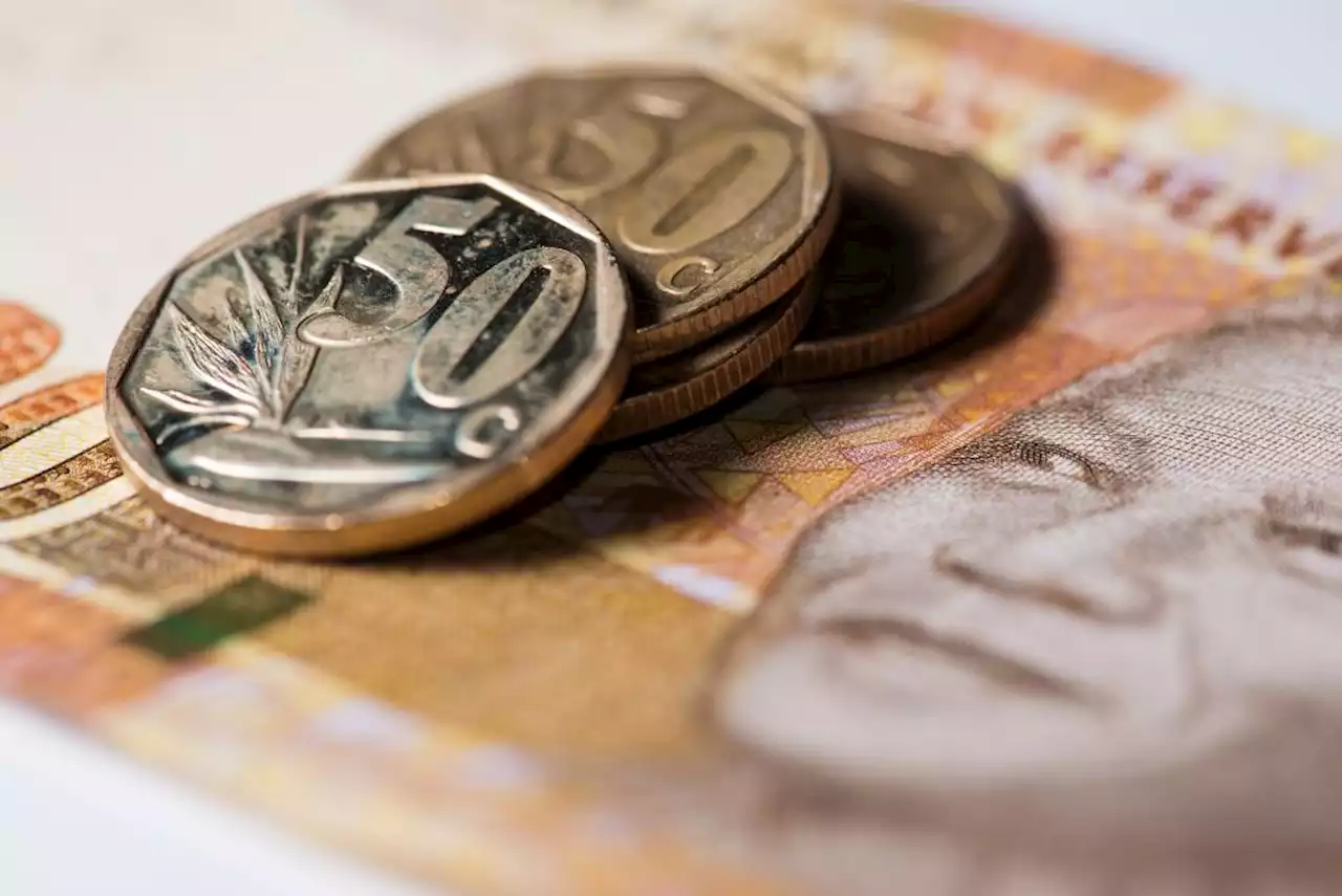 Rand firms as global risk sentiment improves