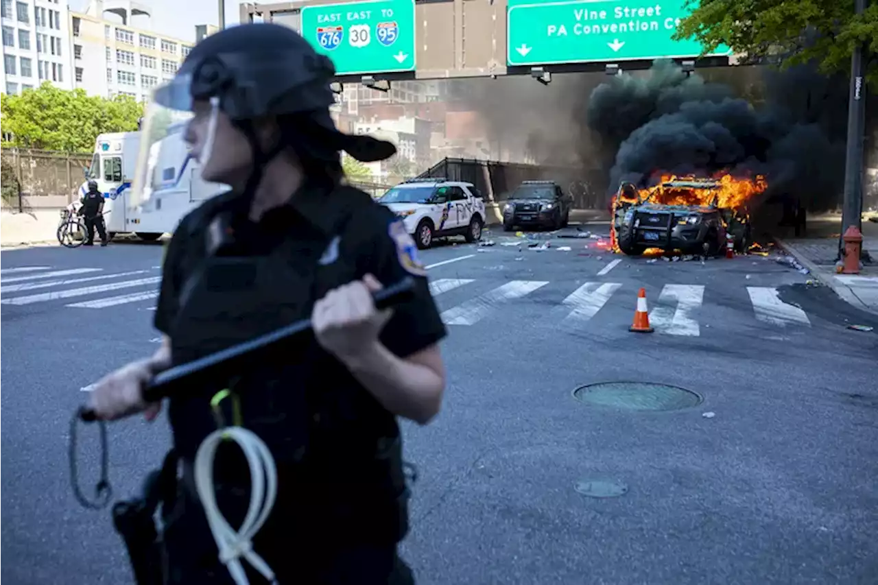 Man accused of torching state police car with a stolen road flare during racial injustice protests pleads guilty