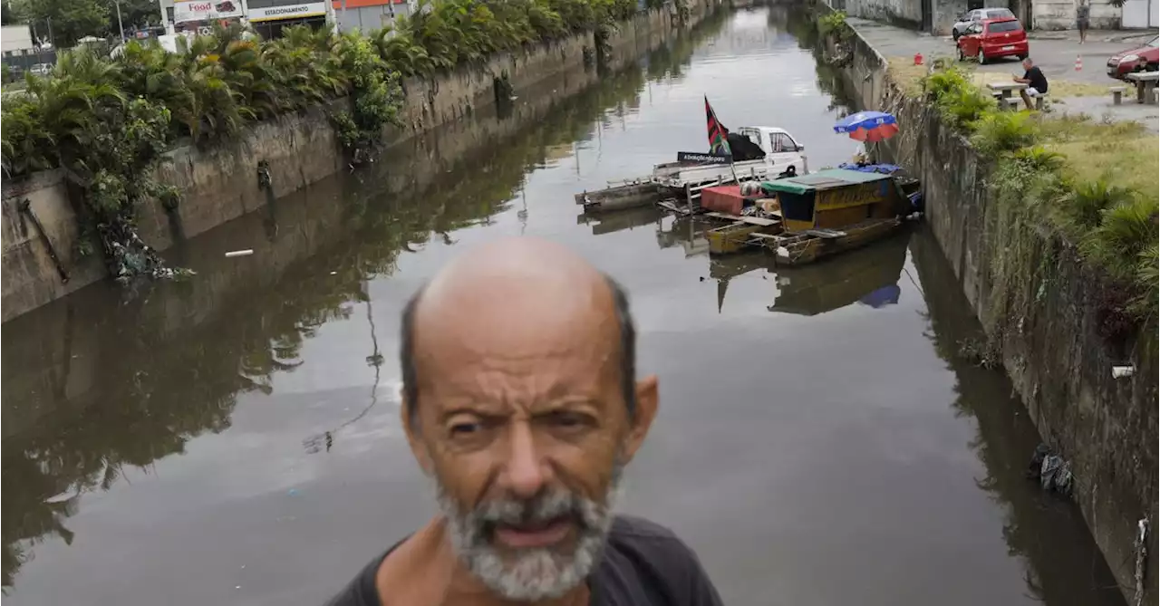 Brazilian man with floating home of scrap strives for environmental change