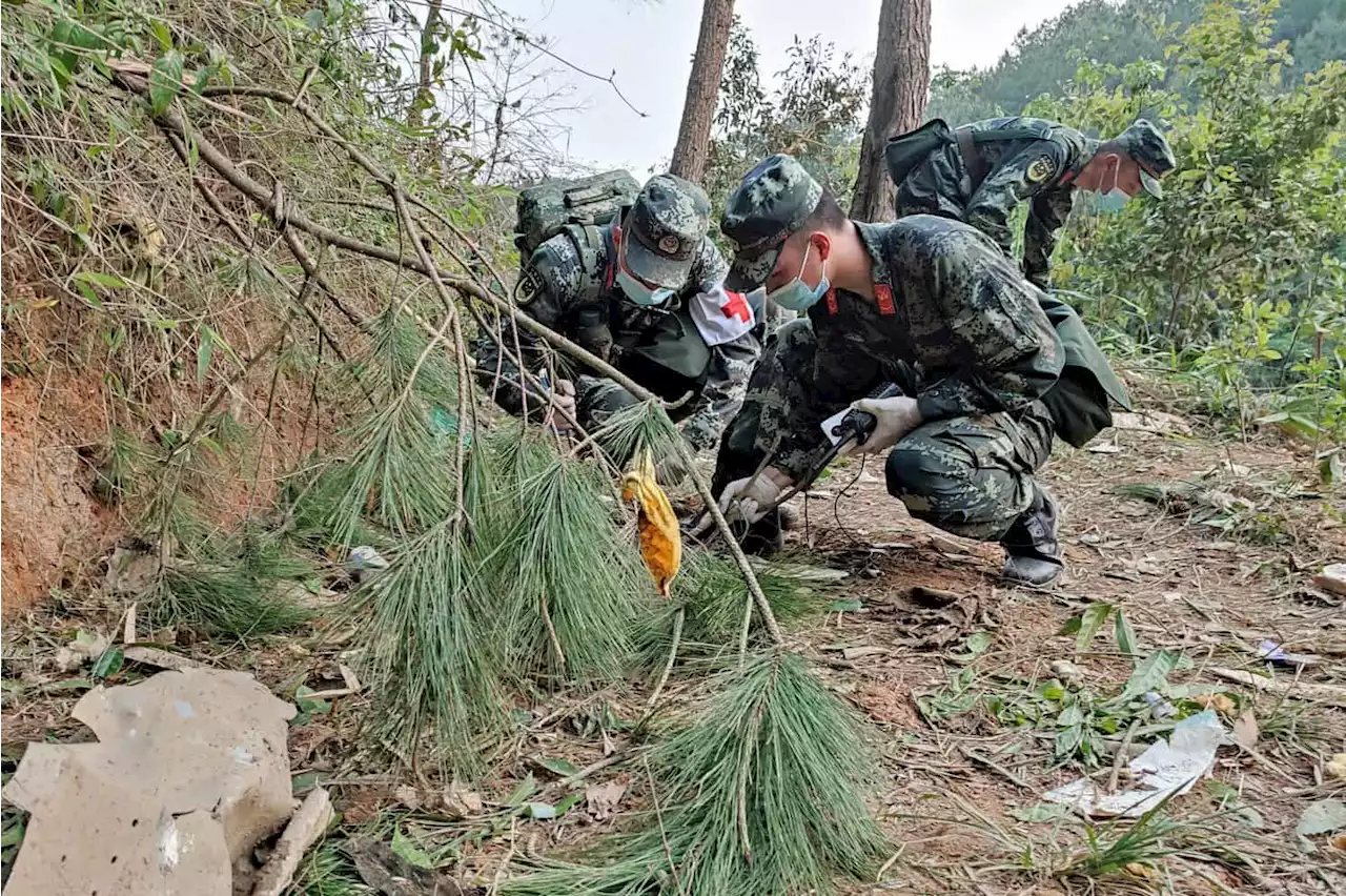 Cause of China jet crash still unknown, as hunt for black boxes continues