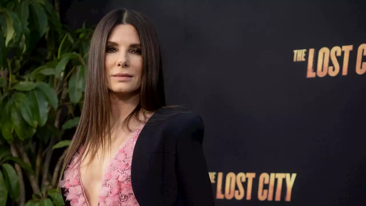 Sandra Bullock looked utterly mesmerising in thigh-high boots at The Lost City premiere