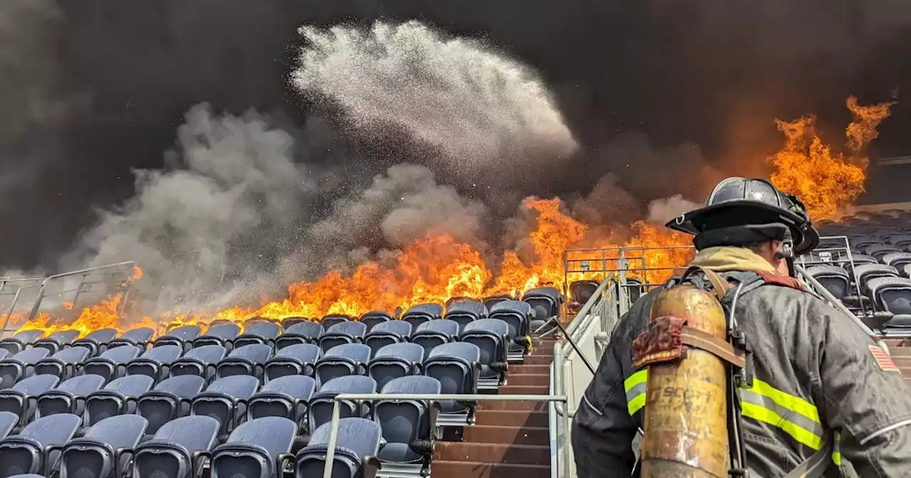 Dramatic images show fire erupting inside Denver's Mile High Stadium