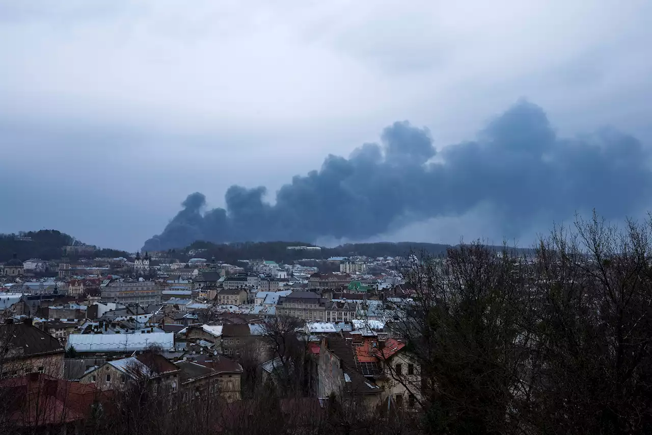 CNN team hears blasts and air raid sirens, sees smoke near Lviv