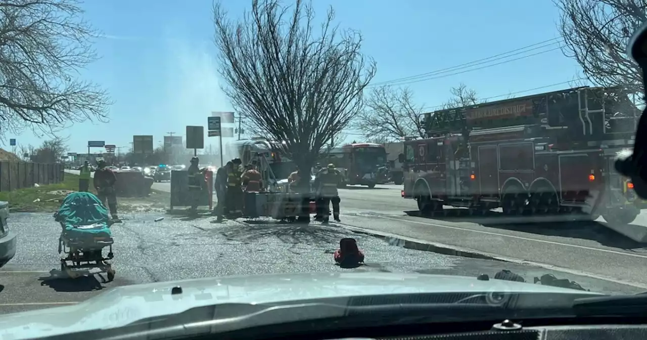 Woman falls through manhole after getting off bus in Roy