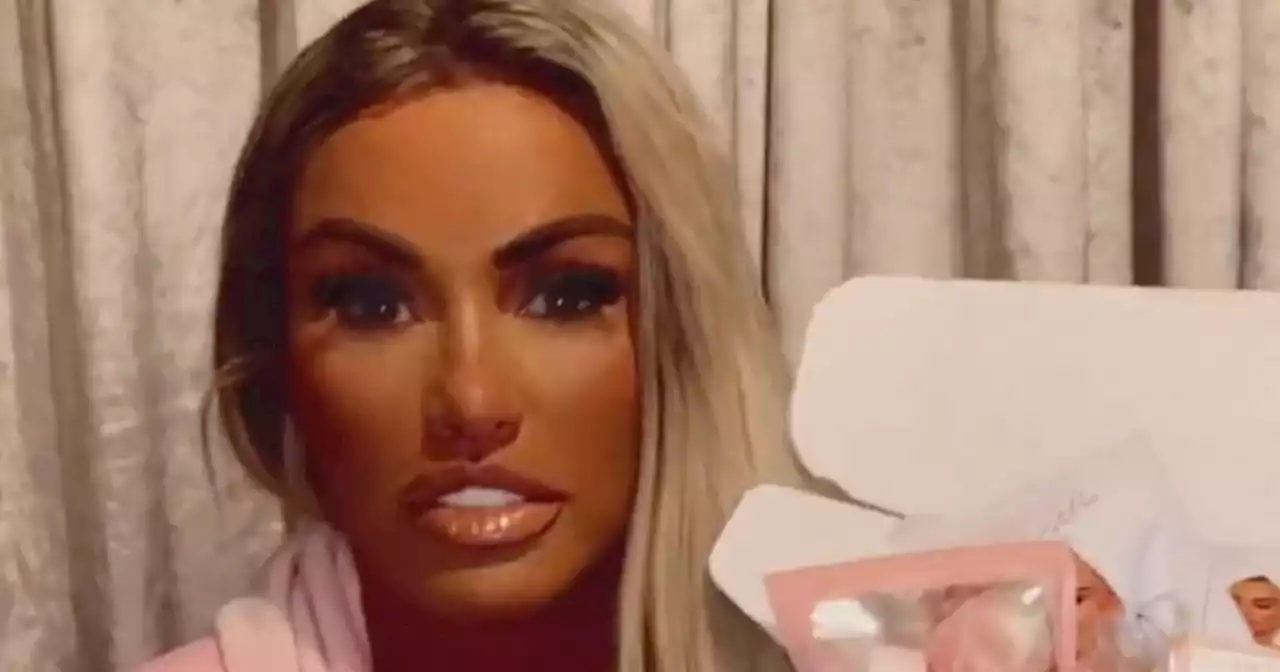 Katie Price films without her engagement ring as Carl Woods deletes couple pics