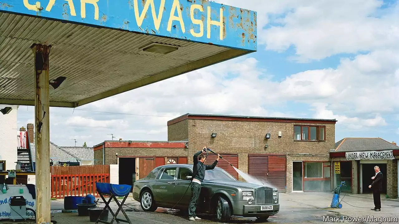 Machines are once again doing the car-washing in Britain