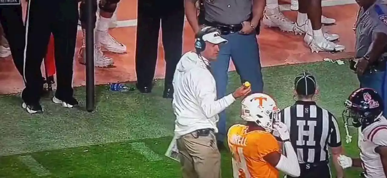 Lane Kiffin trolls Vols, uses golf ball for ceremonial pitch at Ole Miss-Tennessee baseball game