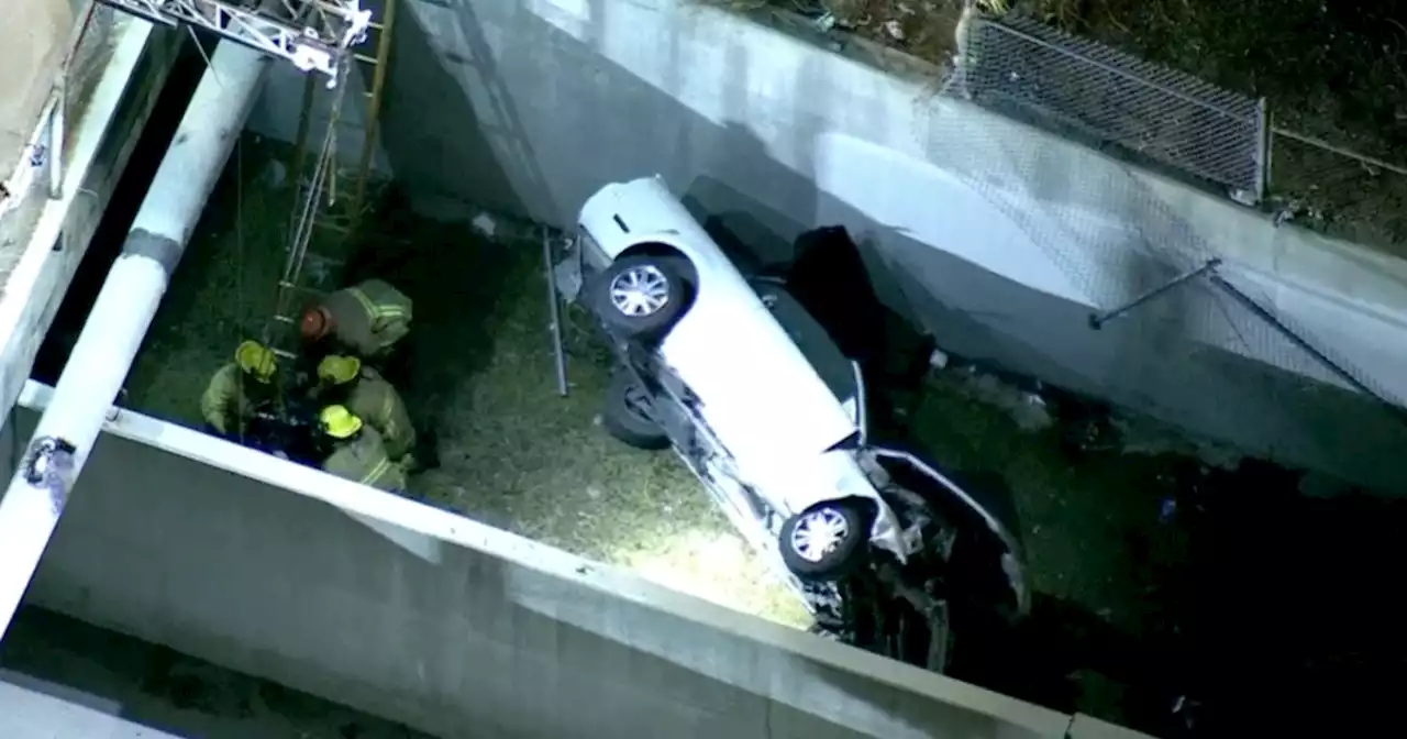 LAFD rescues two patients stranded in vehicle after going into wash in Mission Hills