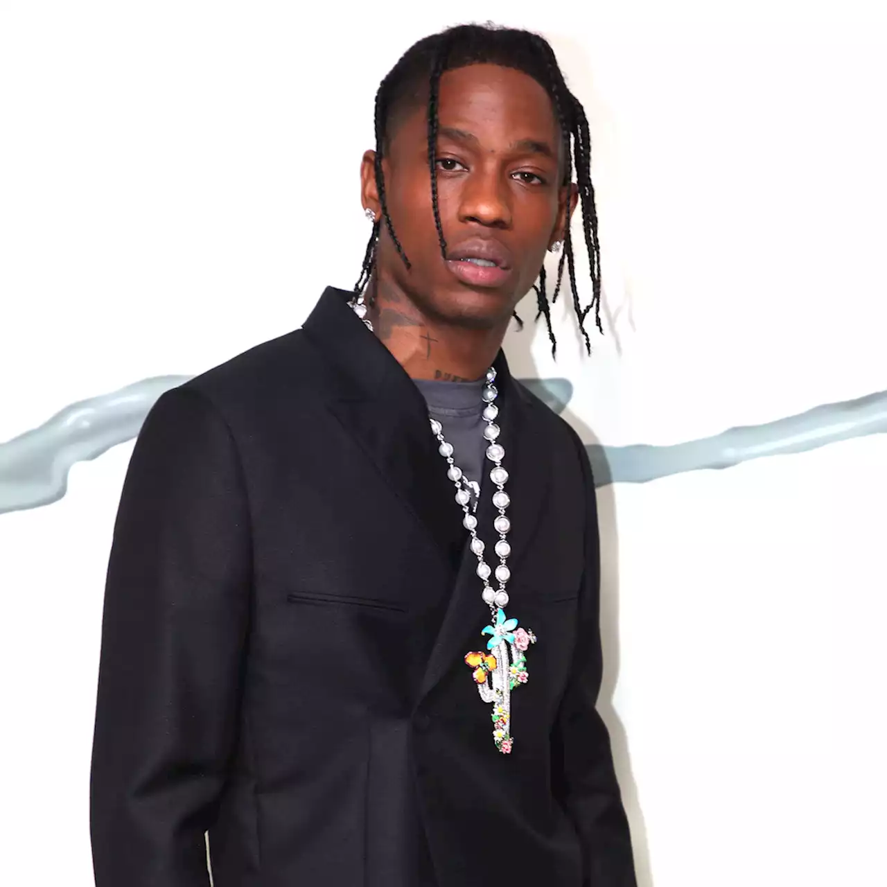 Travis Scott Performs at Star-Studded Pre-Oscars Party—His First Gig Since Astroworld Tragedy - E! Online